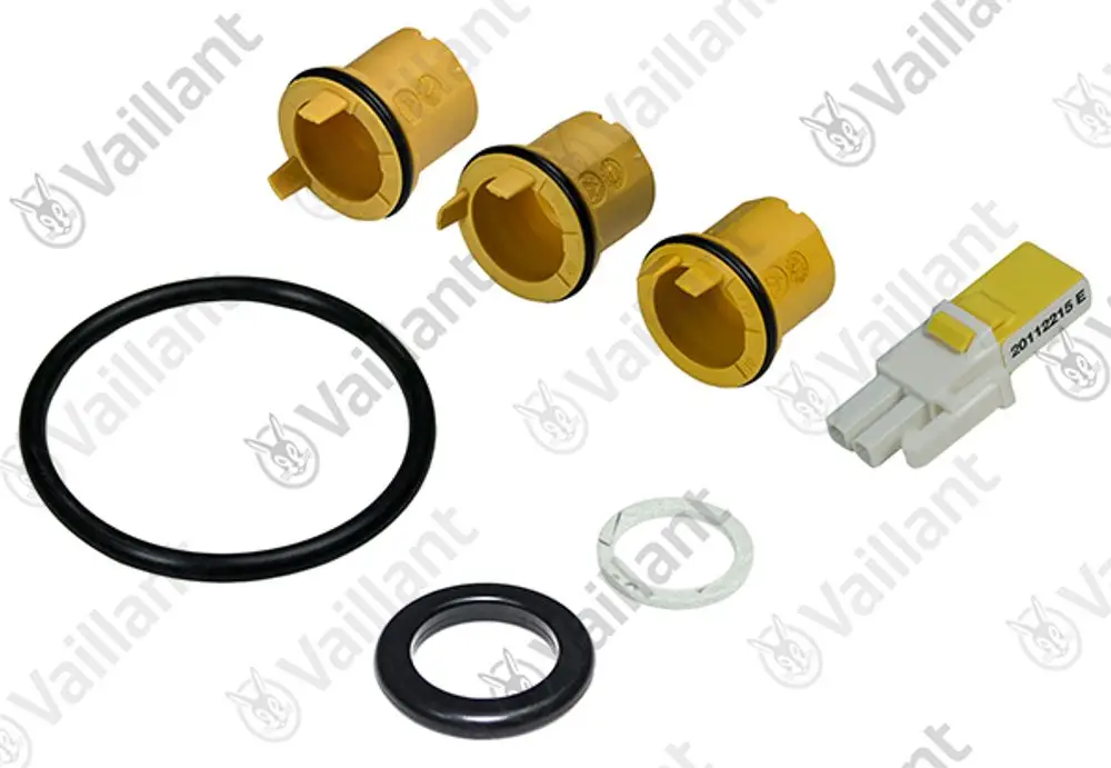 Vaillant Bauteile bestehend aus drei gelben Einsätzen mit O-Ringen sowie einem Kodierstecker. Gezeigt sind verschiedene Zubehörteile für Heizungsanlagen.